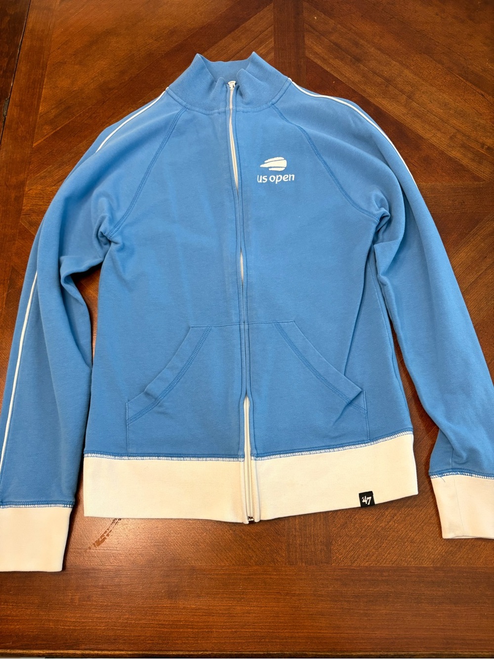 US Open Light Blue Women’s Medium Zip-Front Jacket with Cream Trim. Runs small